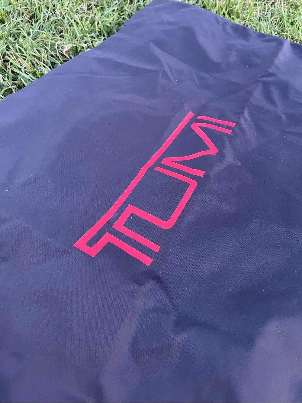 Large Tumi Black Dust Cover with Red Logo